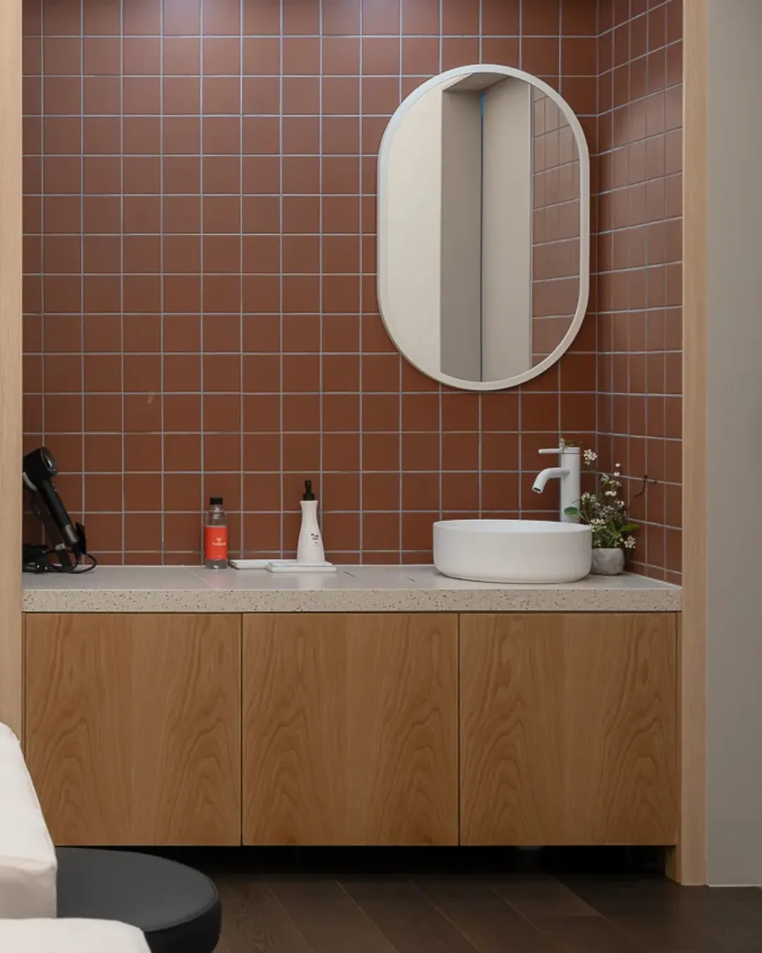 A private suite with a treatment bed and its own basin
